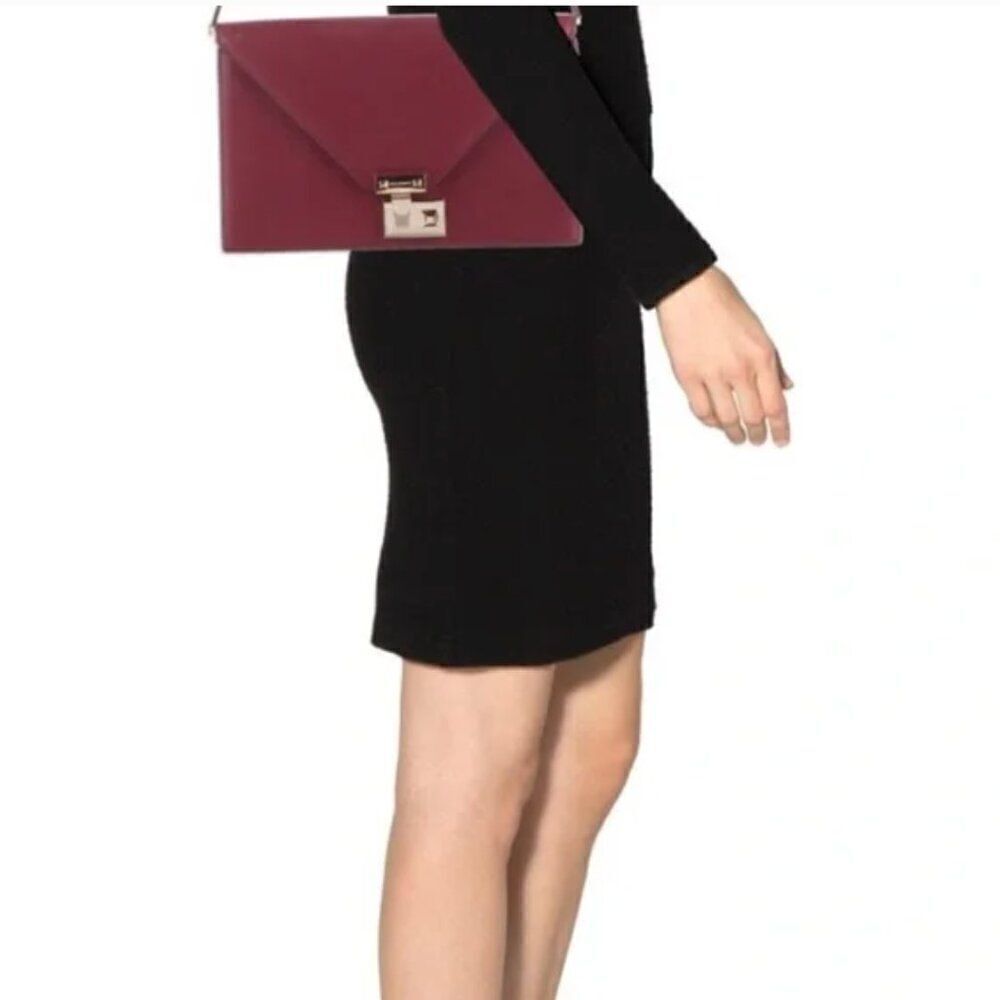 Rebecca Minkoff Burgundy textured leather Paris Clutch with gold-tone hardware!